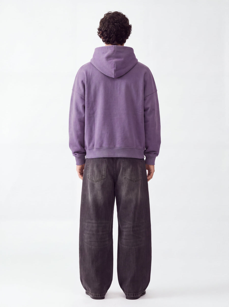 Model wearing the Purple Zipper zip hoodie, back view